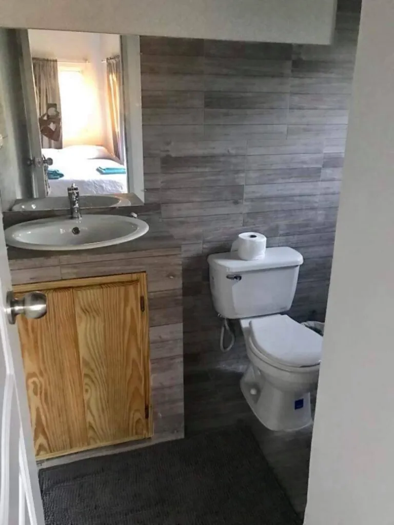 Bathroom with a wooden cabinet