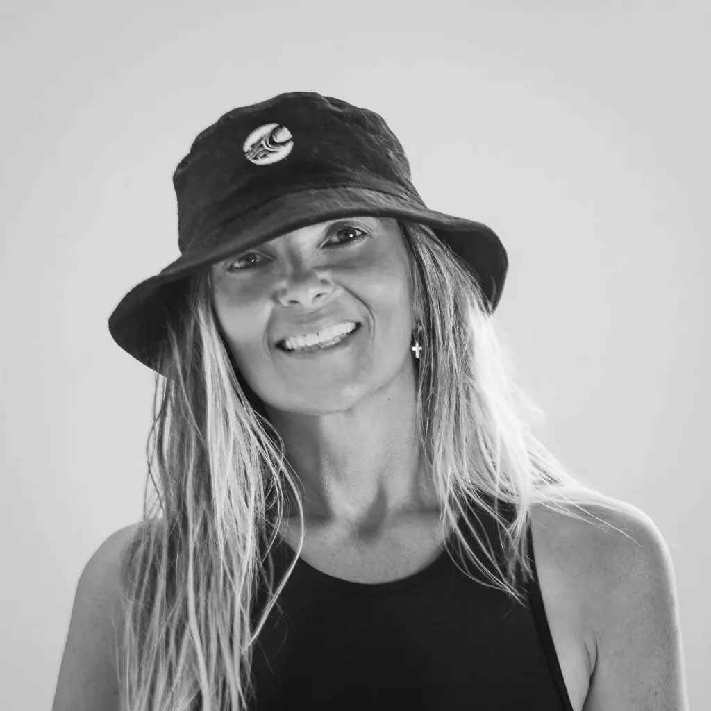 Samuela Mule, black and white portrait, wearing a bucket hat
